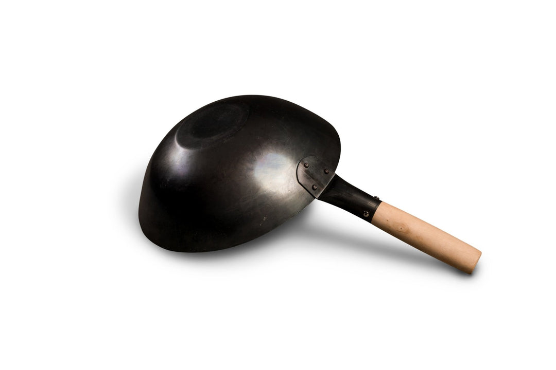 Unser flacher eingebrannter pasoli Wok - pasoli