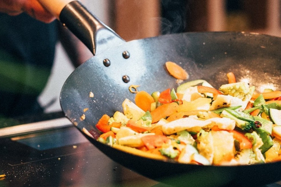Unser flacher eingebrannter pasoli Wok - pasoli