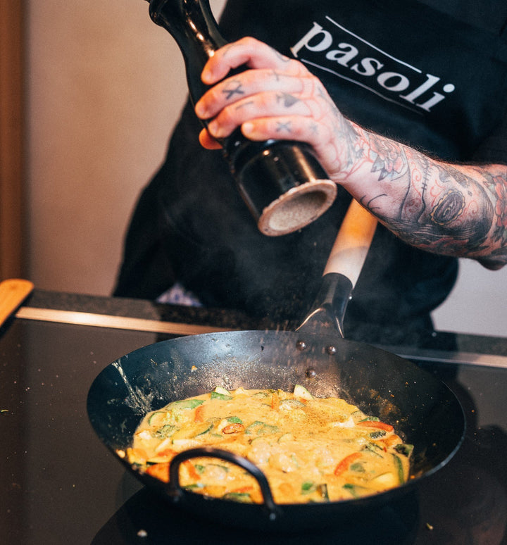 Unser flacher eingebrannter pasoli Wok - pasoli