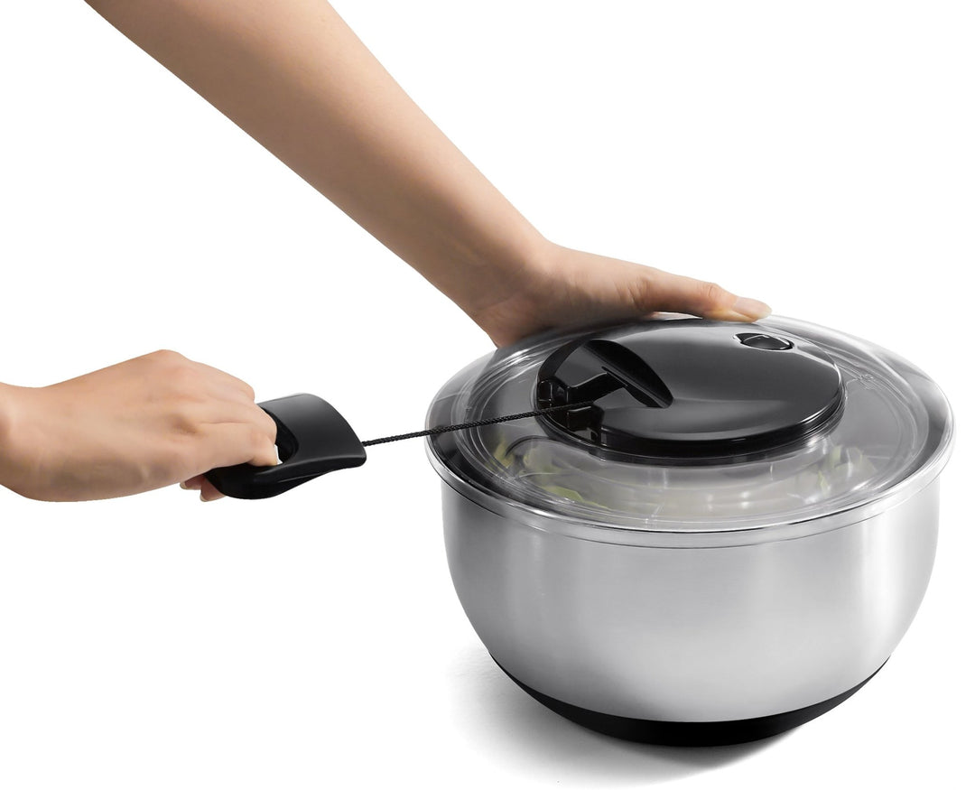 Salatschleuder mit Stopfunktion aus Edelstahl, mit integrierter Mandoline - pasoli GmbH